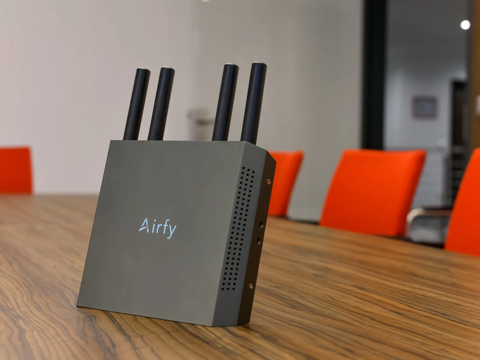 An airfy.node on the table of a meeting room