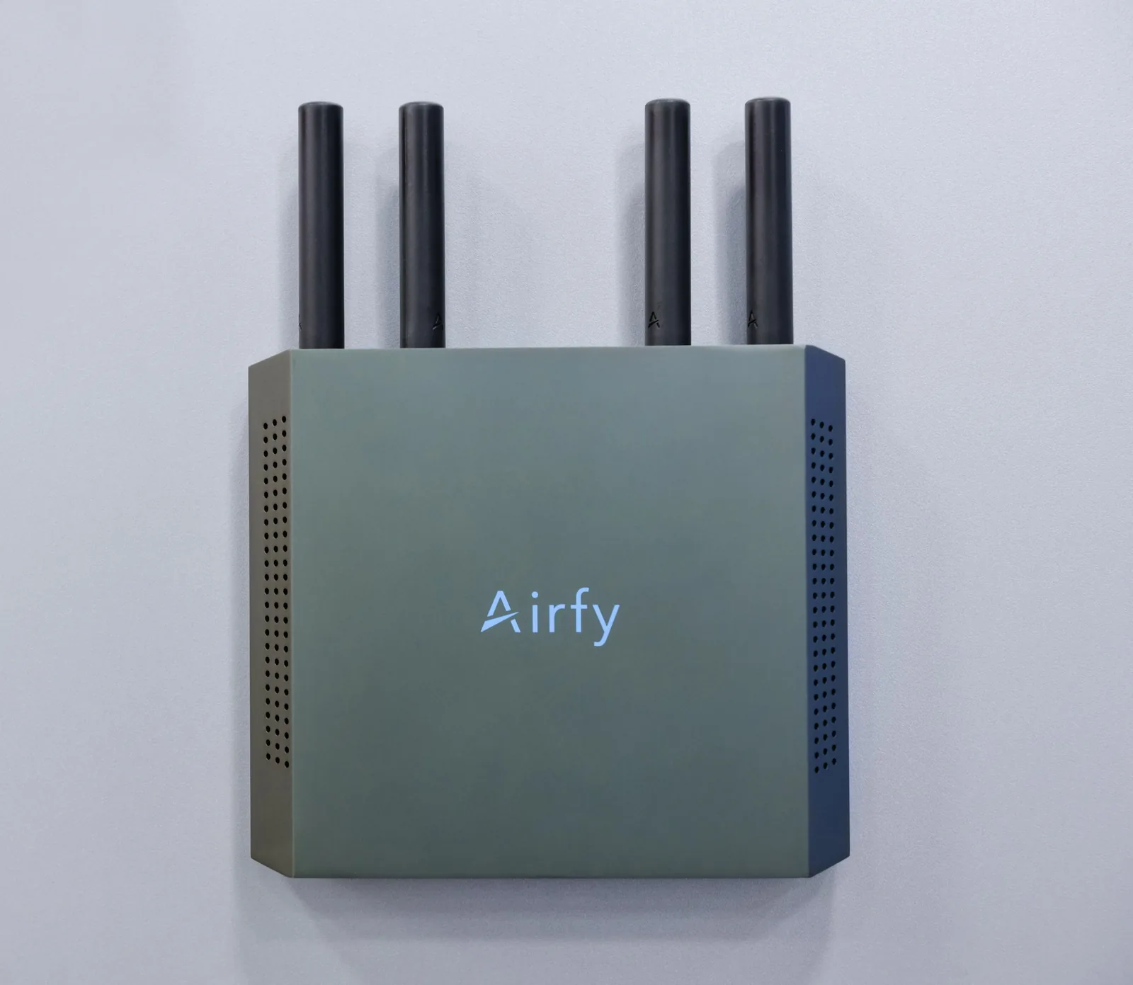 An airfy.node mounted on a wall